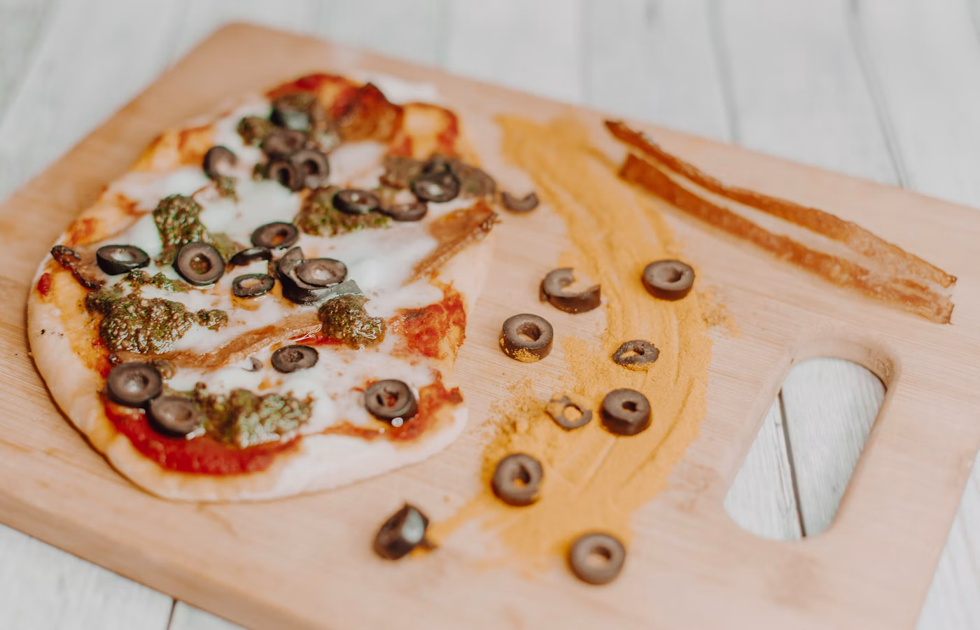 Flatbread pizza on a wooden board